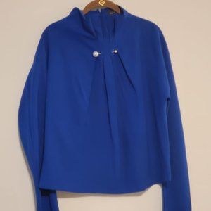 Blue high neck top with neck details